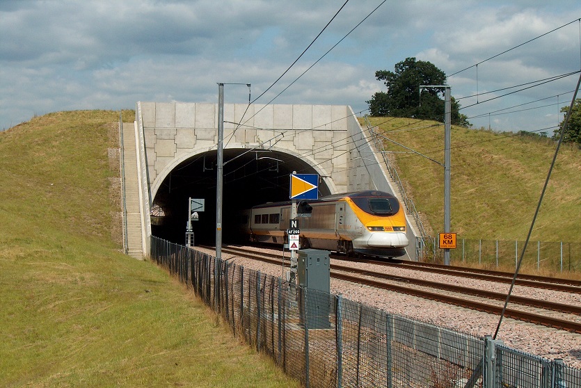 Precast arch solution, TechSpan® by Geoquest, pictured used as a railway tunnel by a high-speed train