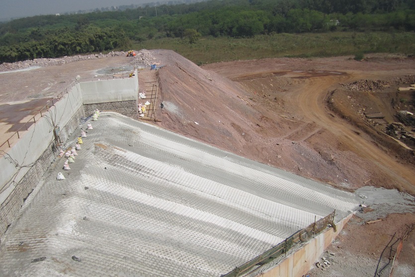 The geotextile, TechRevetment™ formed concrete mattresses, part of the geosynthetics solutions for erosion control. Pictured on a steep slope at a mine site.