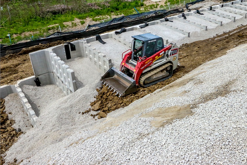 The T-Wall precast modular retaining wall by Geoquest being installed on site.