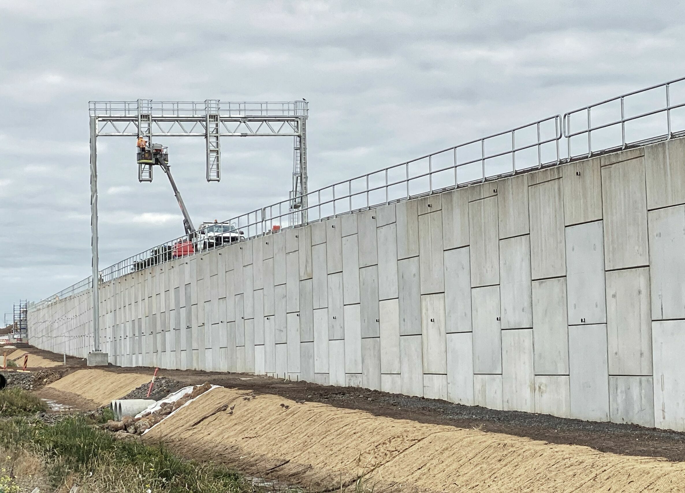 Geoquest walls made of precast concrete and soil interaction structural supports at the South Geelong to Waurn Ponds Duplication Rail Project in Victoria, Australia