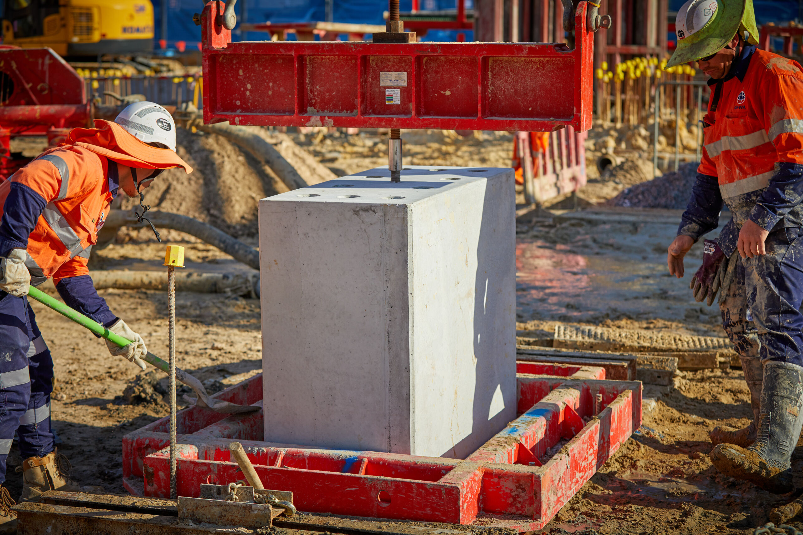 Lowering a precast concrete plunge column for robust foundations at One Subiaco in Perth, Western Australia